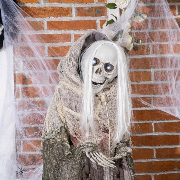 Creepy touch and sound activated skeleton. Halloween yard decor